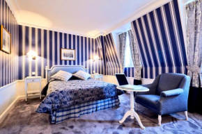 Отель Golden Tulip Washington Opera  Париж